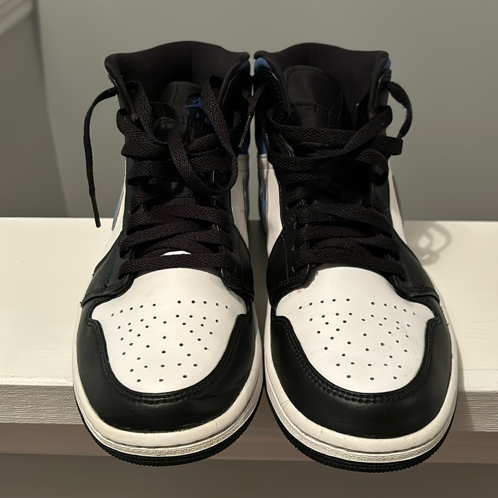 Nike Jordan Retro 1’s in Black and White with Blue swoosh
